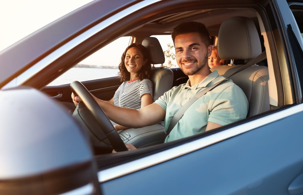 hand holding a car